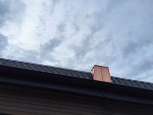 Dach mit Kupferkamin 